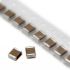 خازن SMD مولتی لایر 100nF پکیج 1210 ولتاژ 50V 